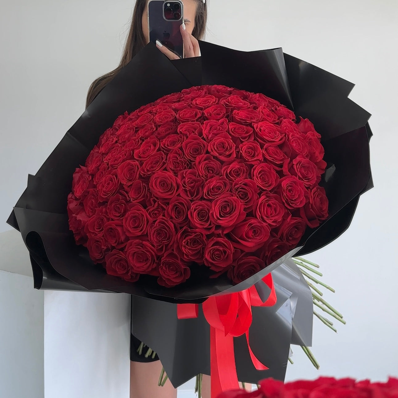 100 Premium Red Roses. Black