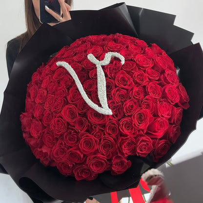 100 Premium Red Roses. Black